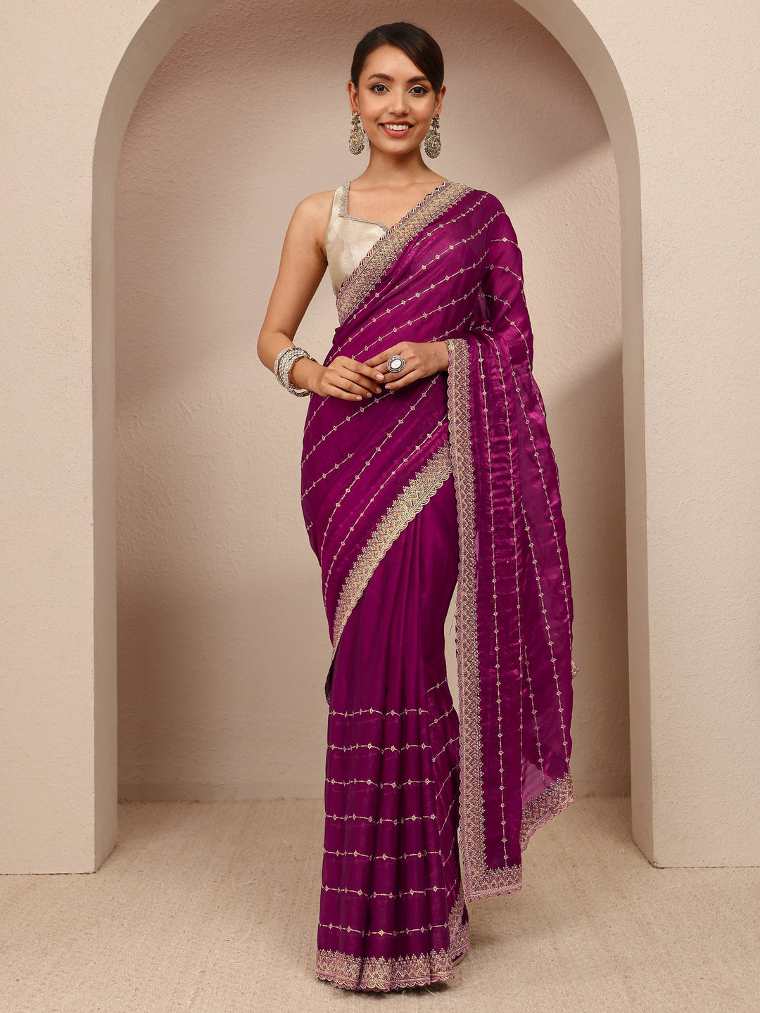  Burgundy Embellished Silk Blend Saree
With Unstitched Blouse Piece 