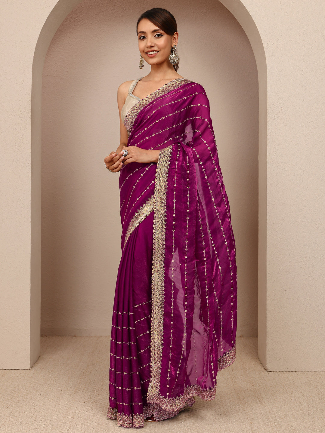  Burgundy Embellished Silk Blend Saree
With Unstitched Blouse Piece 