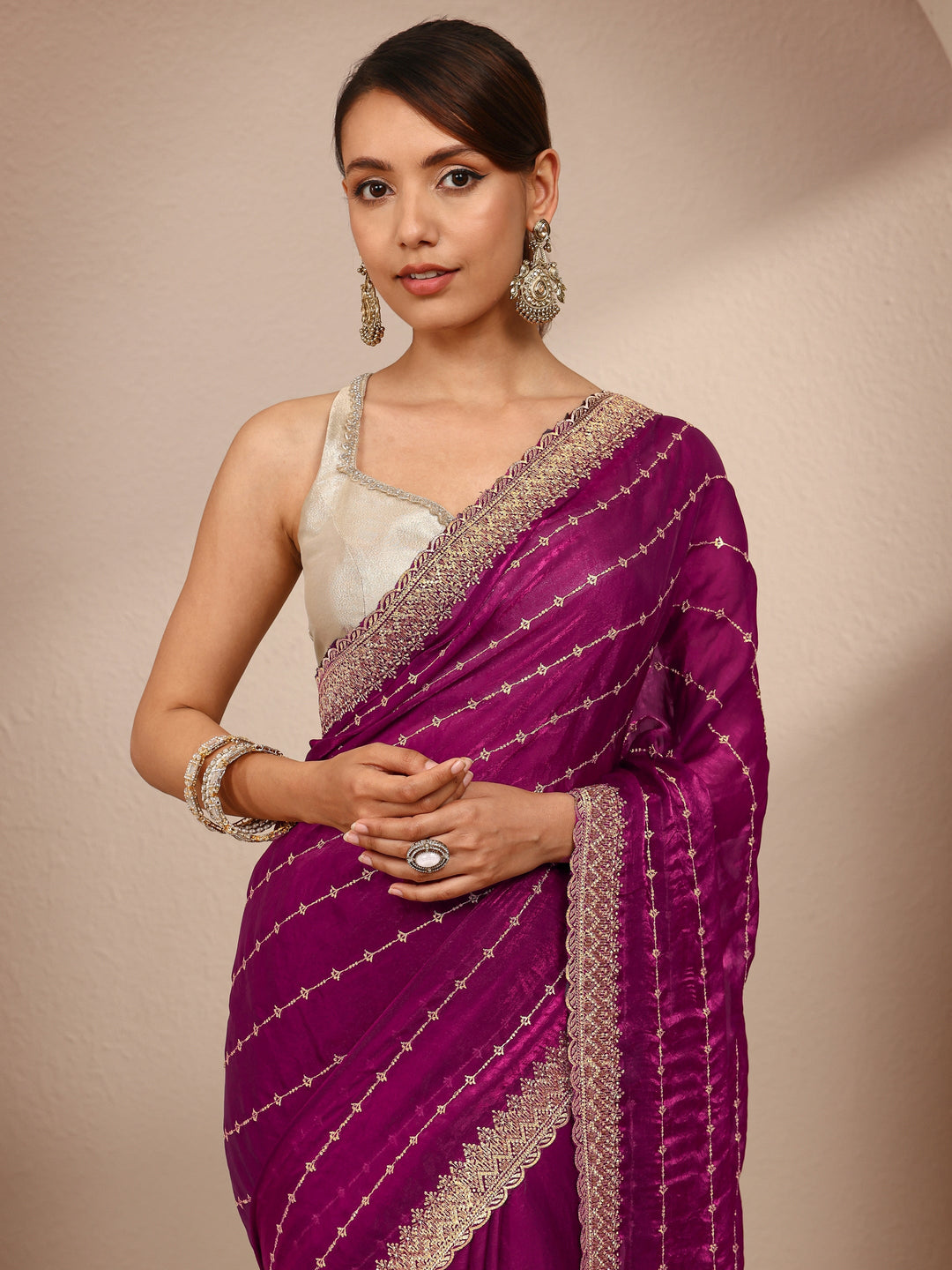  Burgundy Embellished Silk Blend Saree
With Unstitched Blouse Piece 