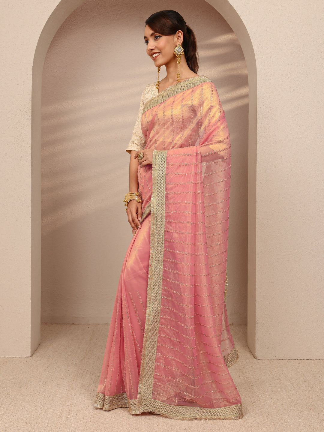  Pink Embellished Silk Blend Saree
With Unstitched Blouse Piece 