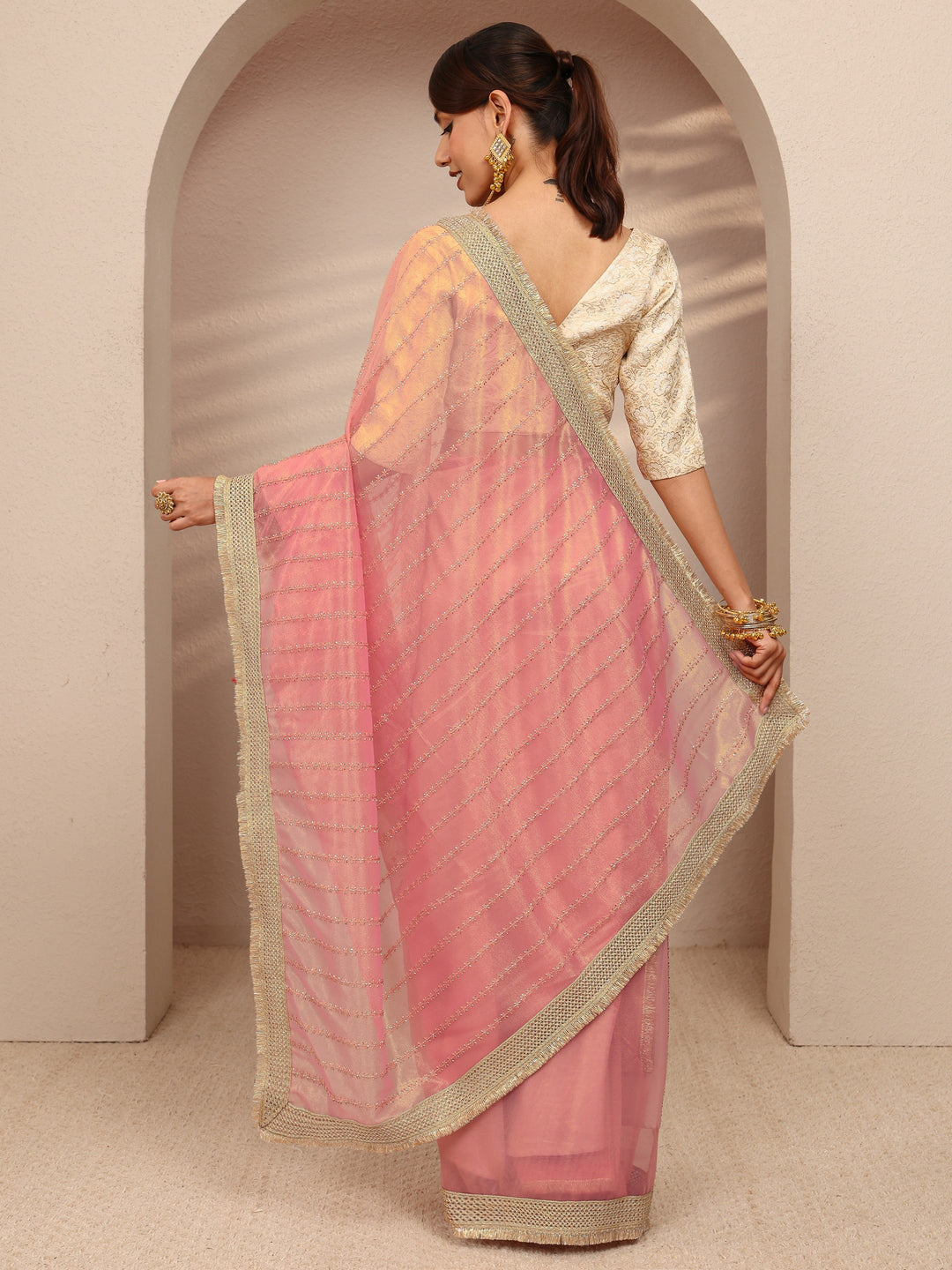  Pink Embellished Silk Blend Saree
With Unstitched Blouse Piece 