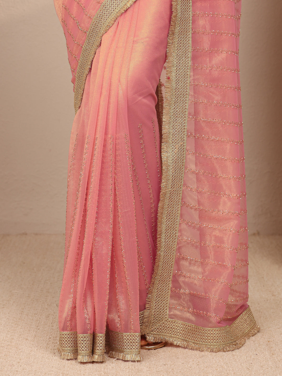 Pink Embellished Silk Blend Saree
With Unstitched Blouse Piece 