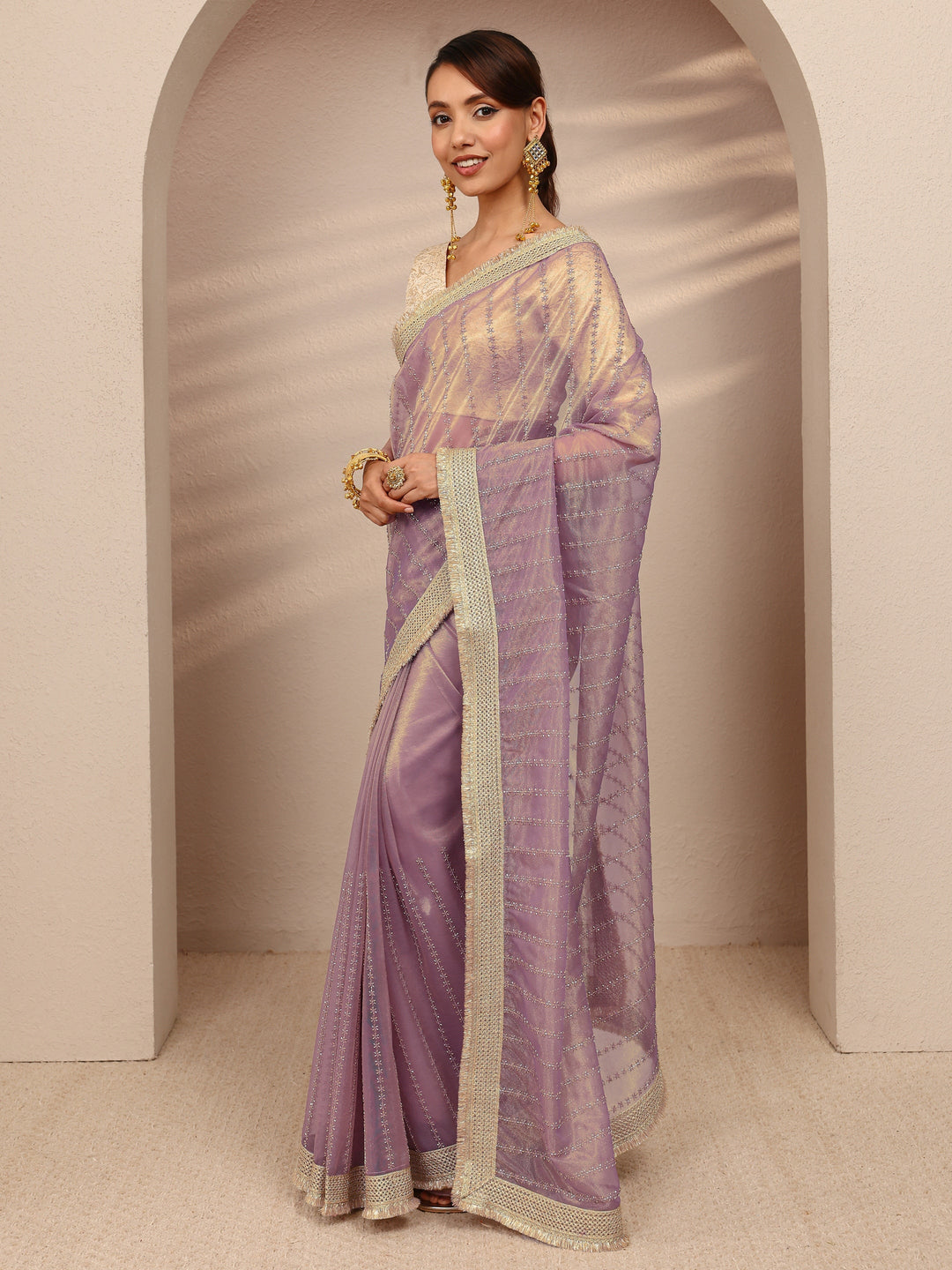  Lavender Embellished Silk Blend Saree
With Unstitched Blouse Piece 