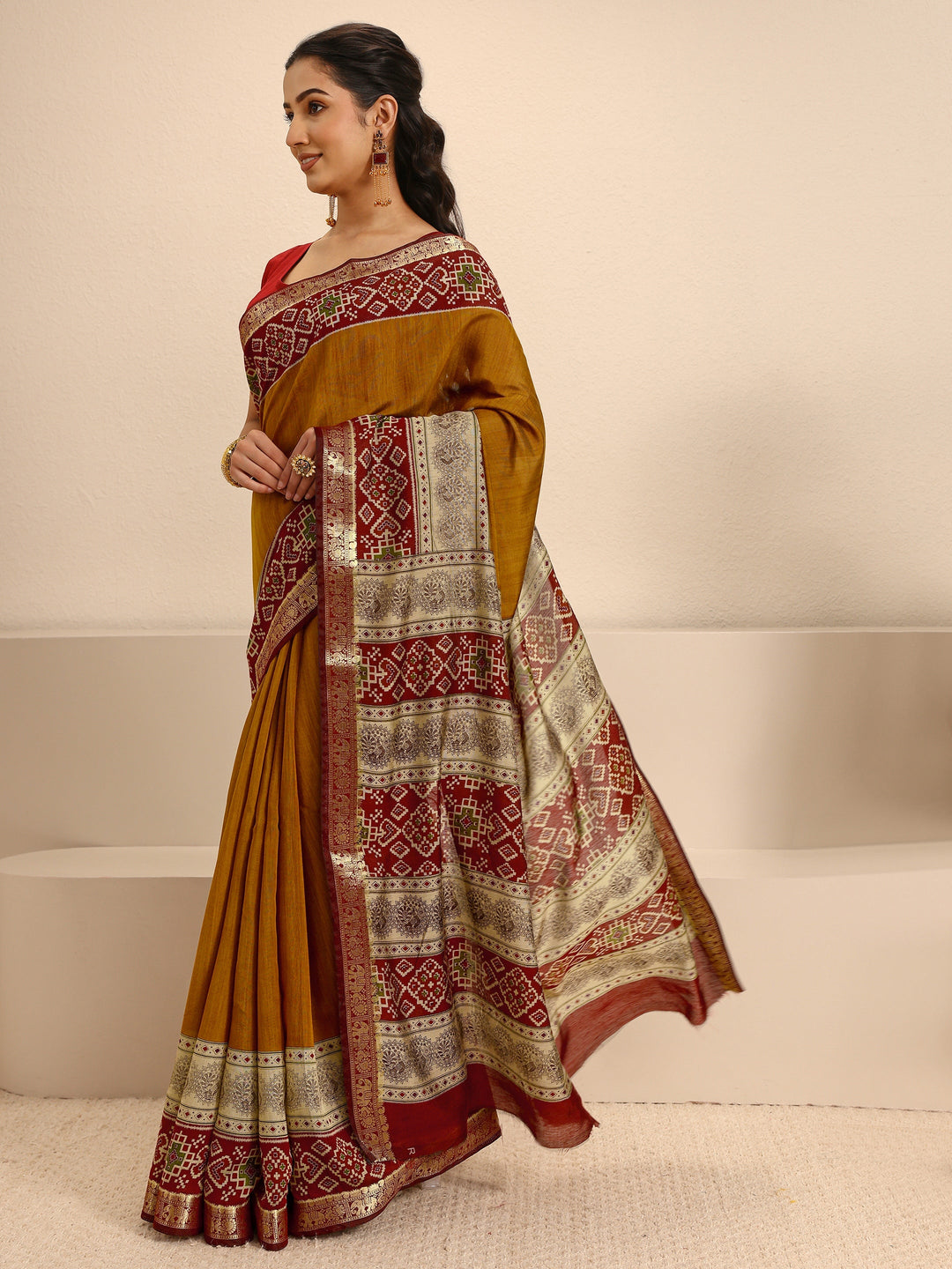  Mustard Silk Blend Patola Saree With Unstitched Blouse Piece 