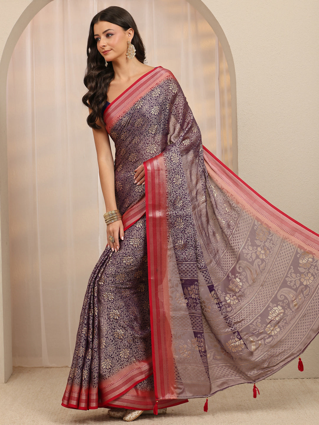  Purple Woven Design Silk Blend Saree 
With Unstitched Blouse Piece 