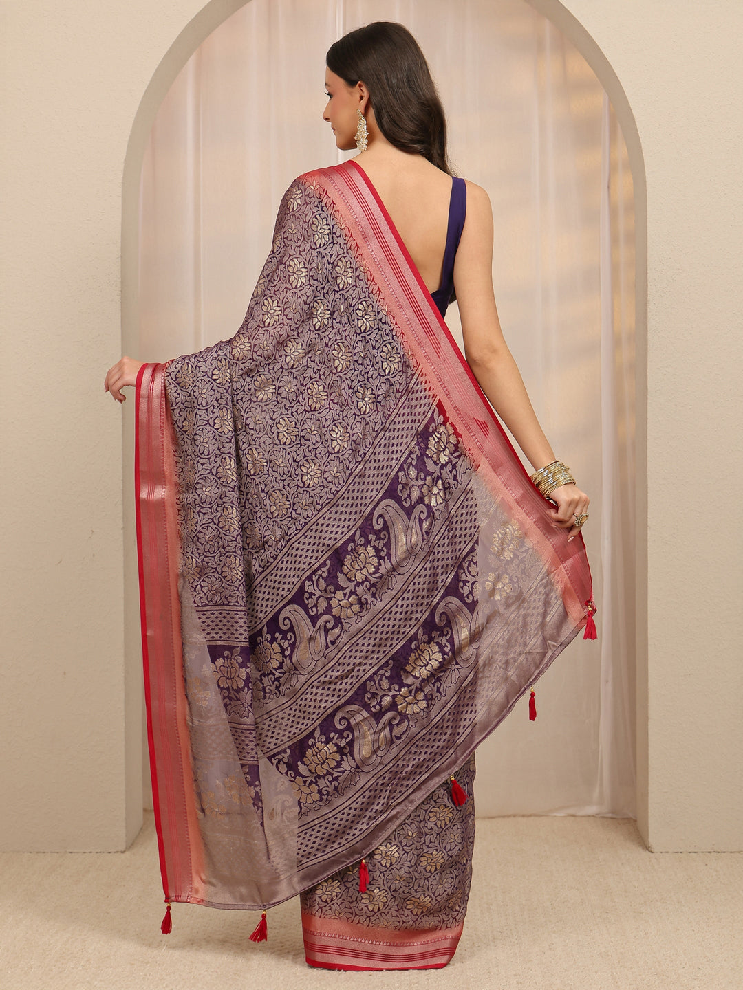  Purple Woven Design Silk Blend Saree 
With Unstitched Blouse Piece 
