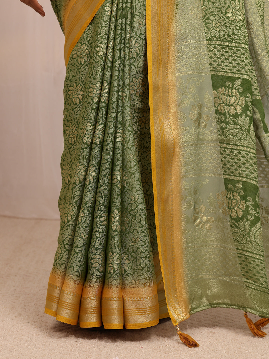  Green Woven Design Silk Blend Saree 
With Unstitched Blouse Piece 