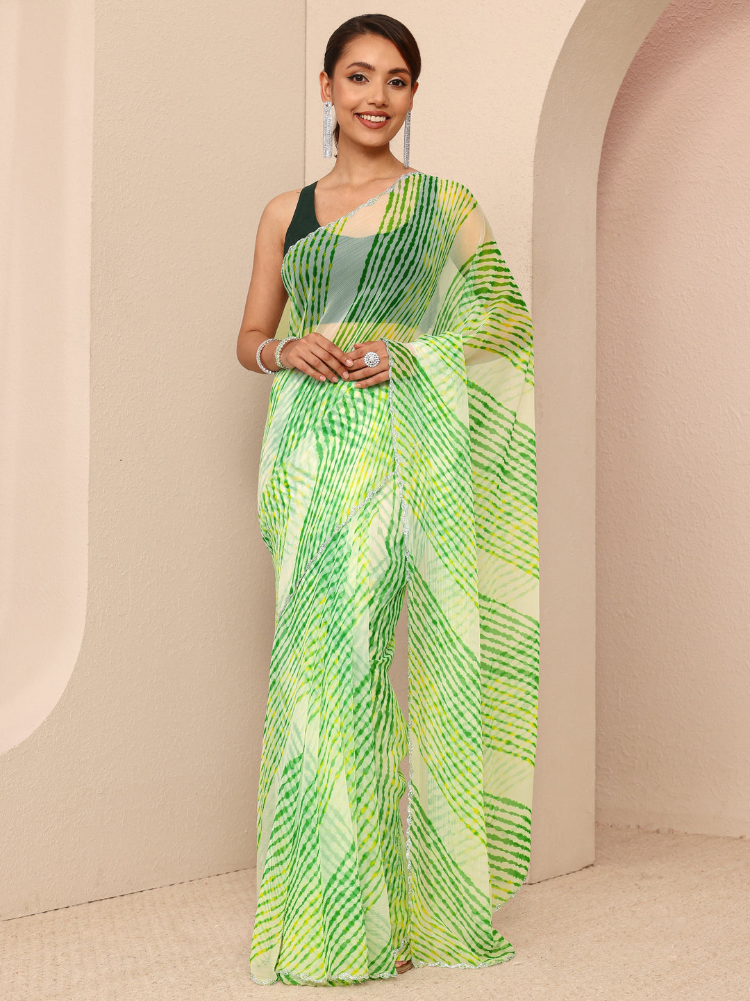  Green Leheriya Printed Chiffon Saree
With Unstitched Blouse Piece 