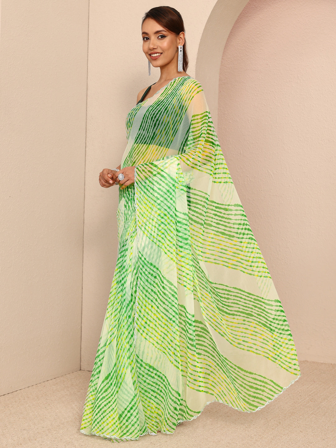  Green Leheriya Printed Chiffon Saree
With Unstitched Blouse Piece 