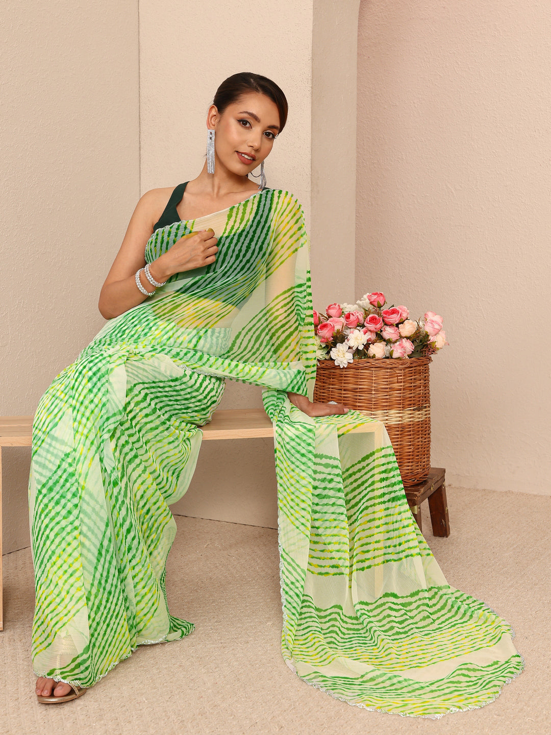 Green Leheriya Printed Chiffon Saree
With Unstitched Blouse Piece