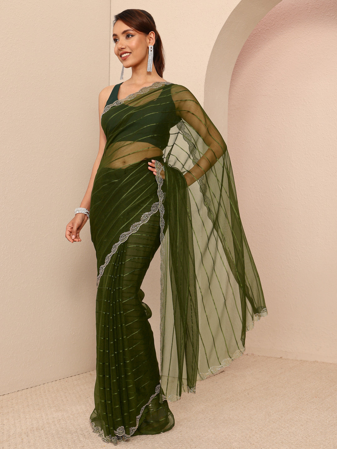  Green Striped Embellished Silk Blend Saree
With Unstitched Blouse Piece 