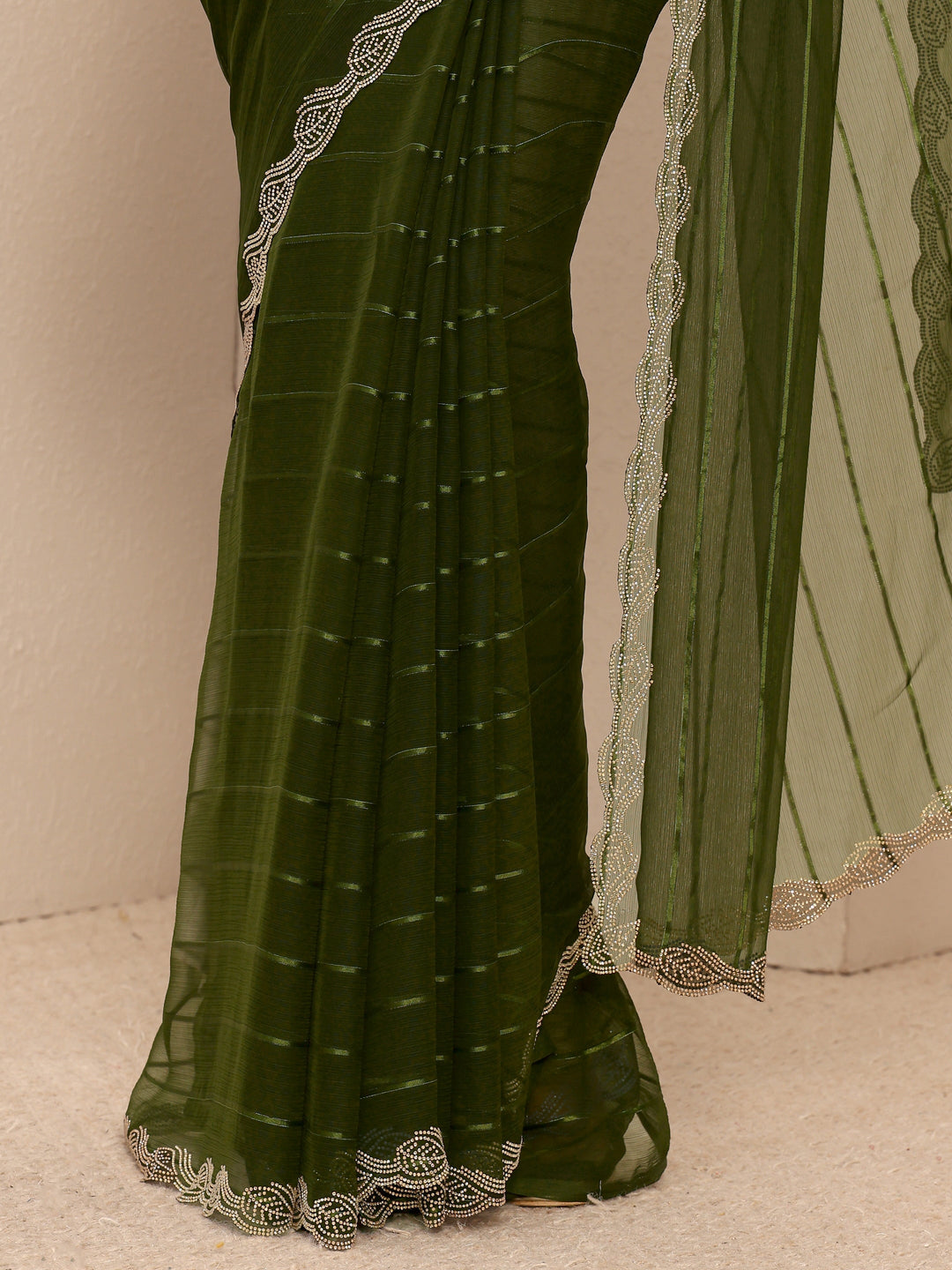  Green Striped Embellished Silk Blend Saree
With Unstitched Blouse Piece 