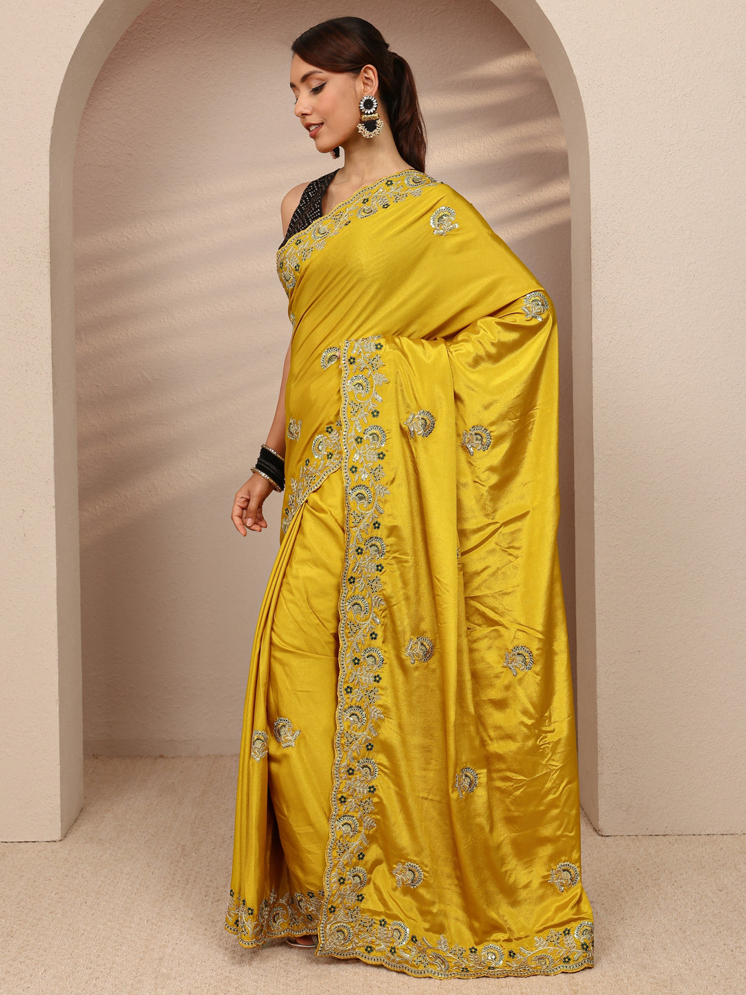  Mustard Floral Embroidered Satin Saree
With Unstitched Blouse Piece 