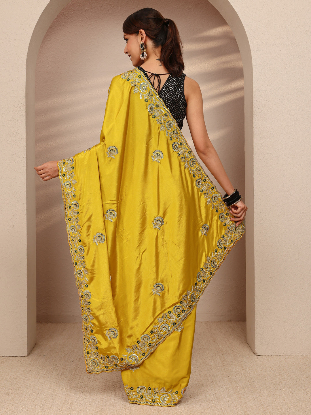  Mustard Floral Embroidered Satin Saree
With Unstitched Blouse Piece 