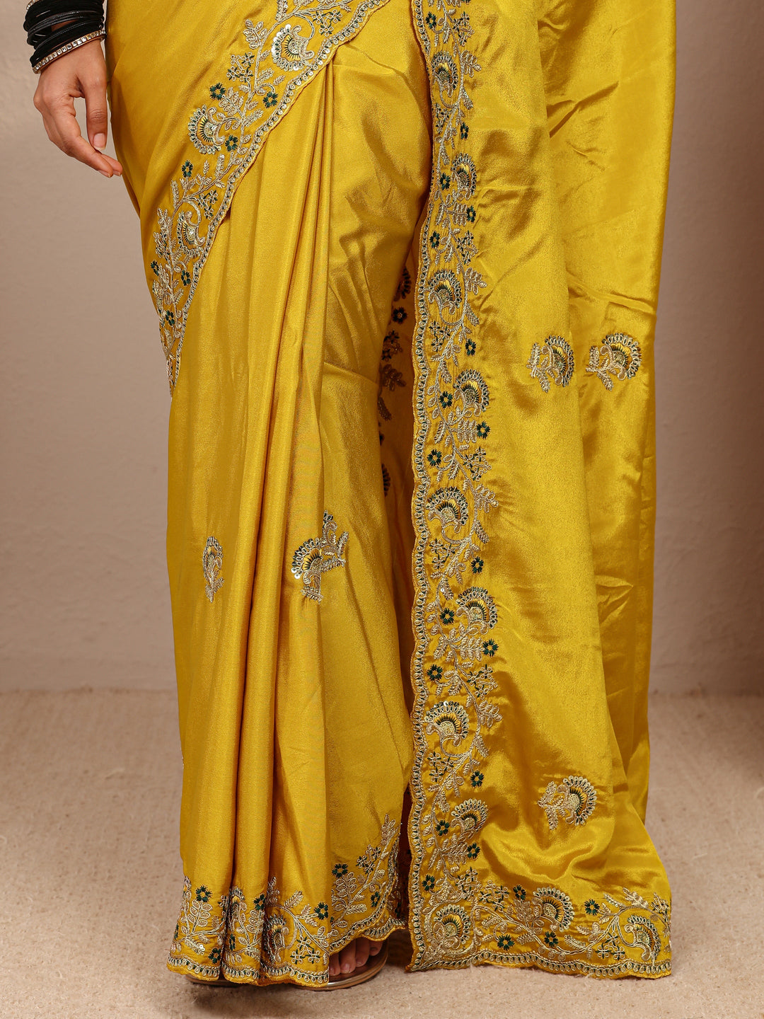  Mustard Floral Embroidered Satin Saree
With Unstitched Blouse Piece 