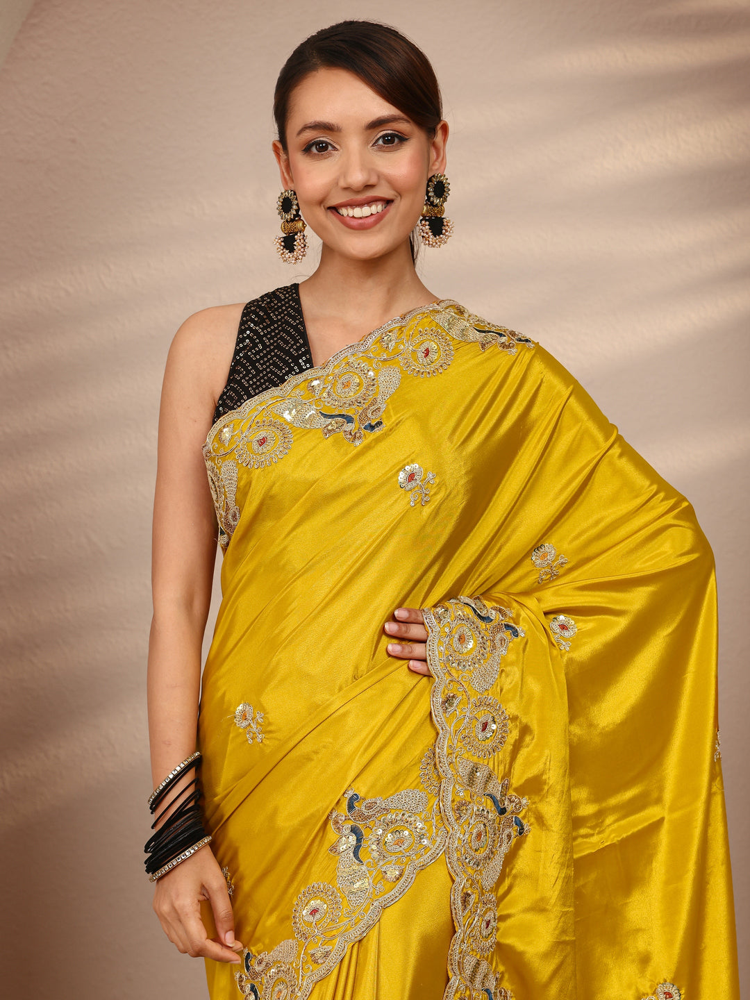  Mustard Floral Embellished Satin Saree
With Unstitched Blouse Piece 