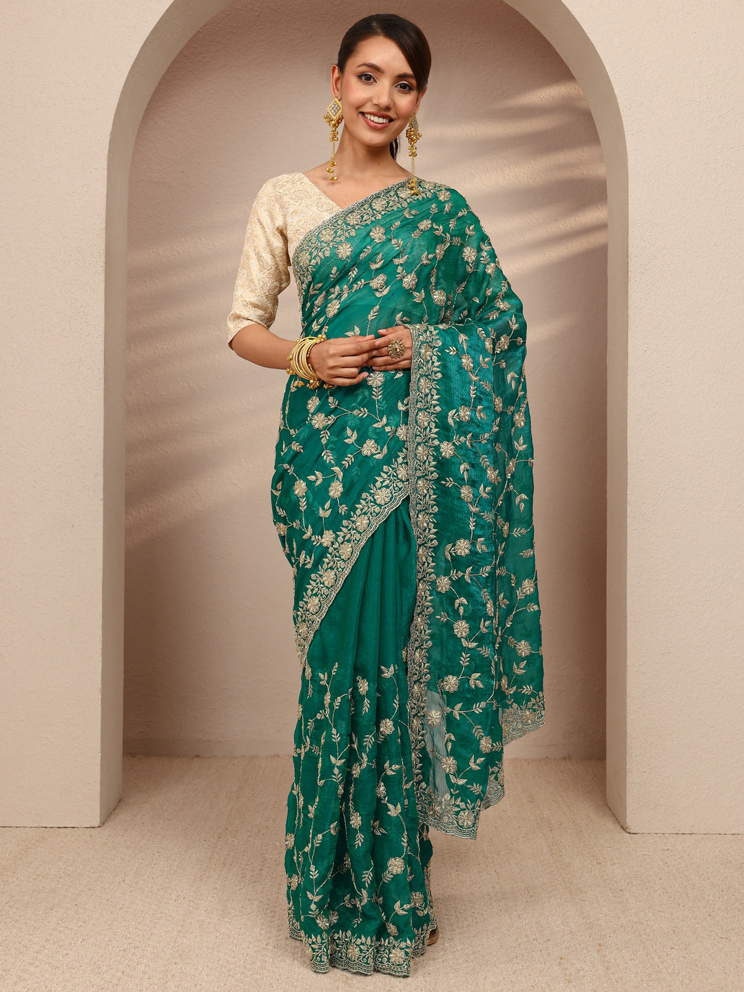  Green Floral Embellished Chiffon Saree
With Unstitched Blouse Piece 