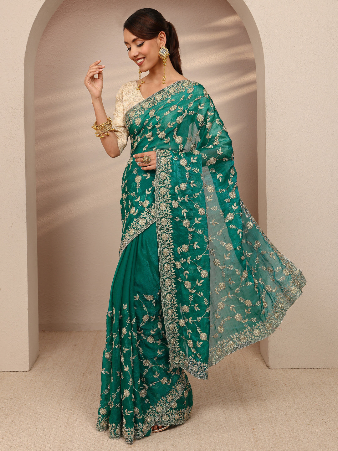  Green Floral Embellished Chiffon Saree
With Unstitched Blouse Piece 