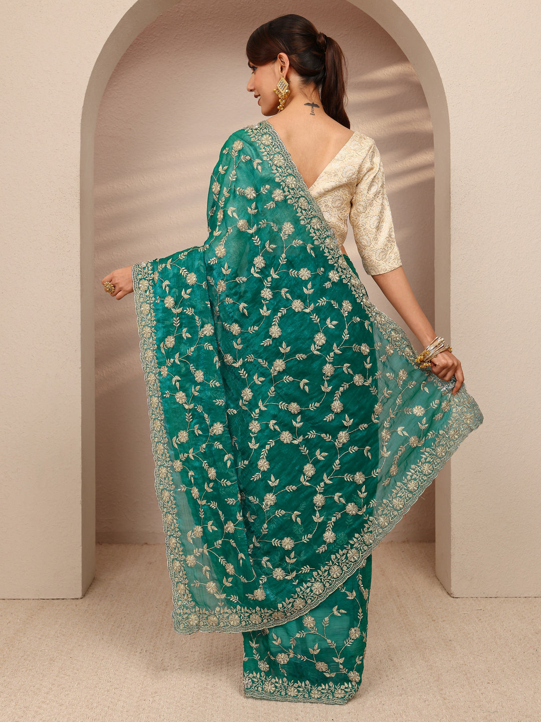  Green Floral Embellished Chiffon Saree
With Unstitched Blouse Piece 