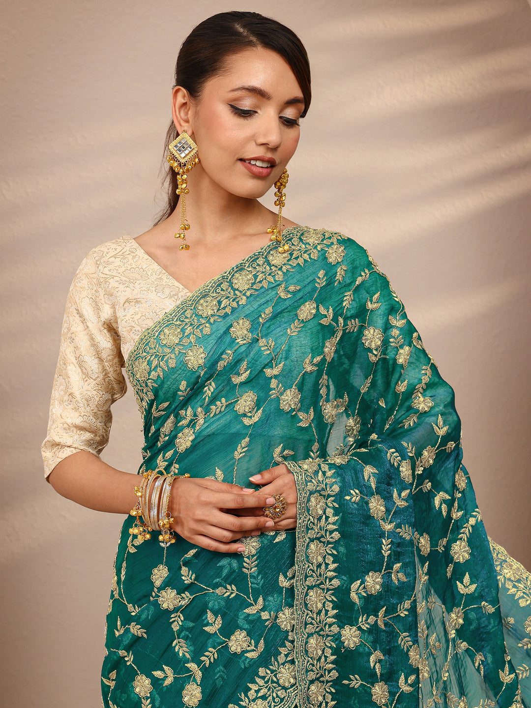  Green Floral Embellished Chiffon Saree
With Unstitched Blouse Piece 