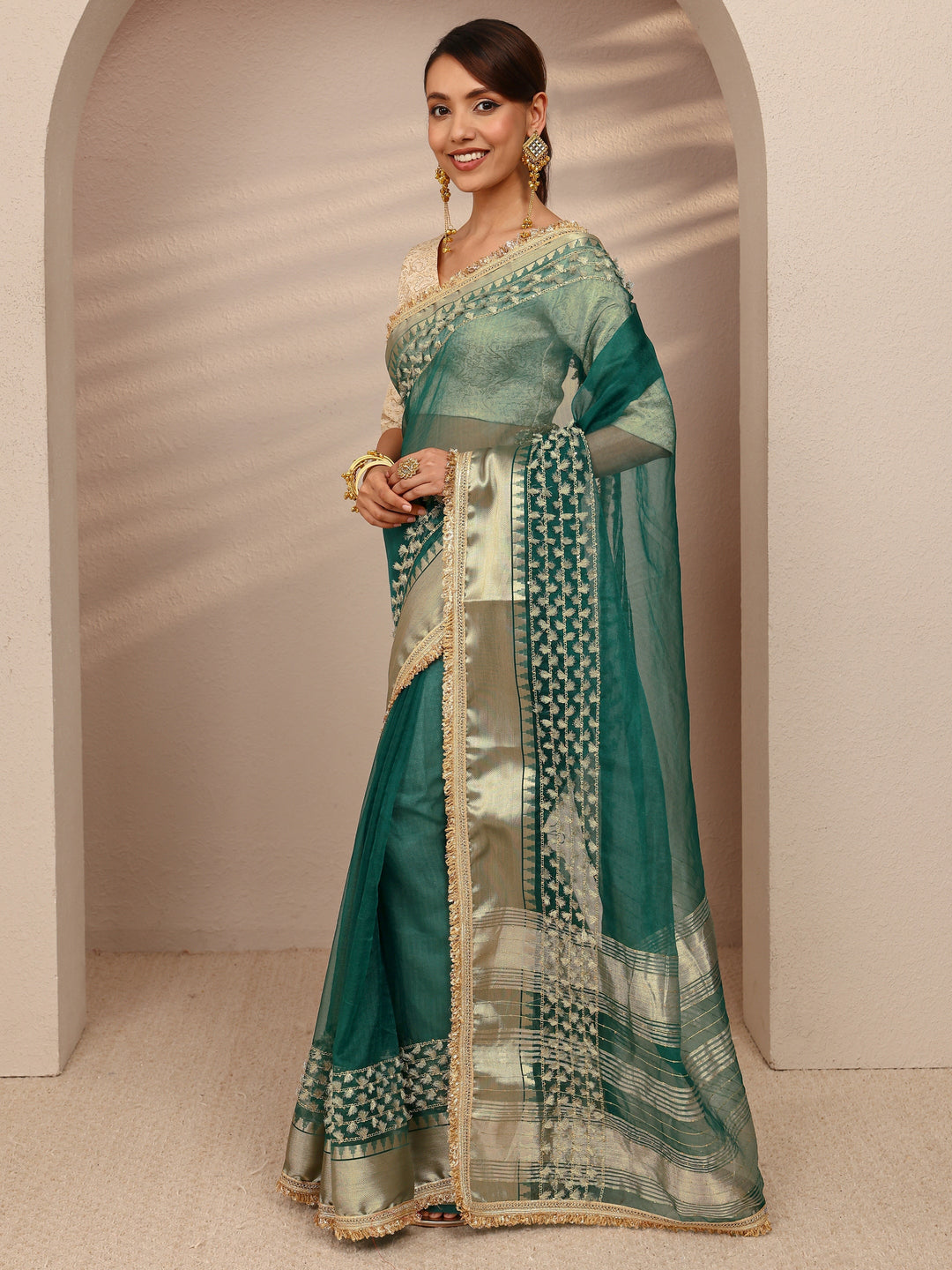  Green Woven Design Chanderi Silk Saree
With Unstitched Blouse Piece 