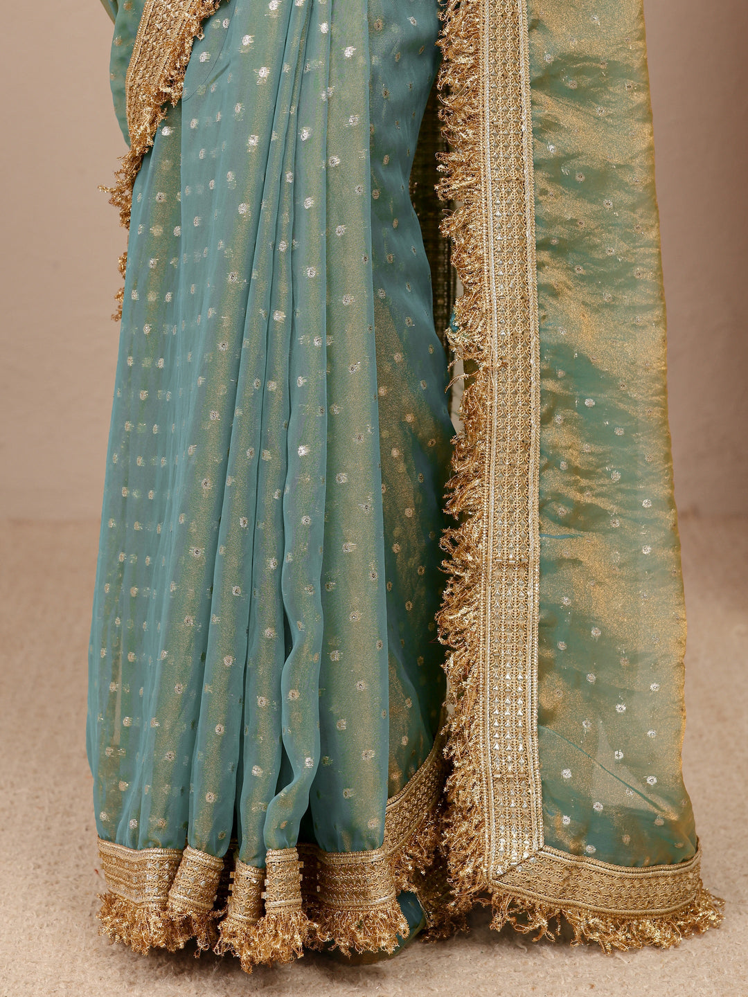  Green Woven Design Tissue Saree
With Unstitched Blouse Piece 