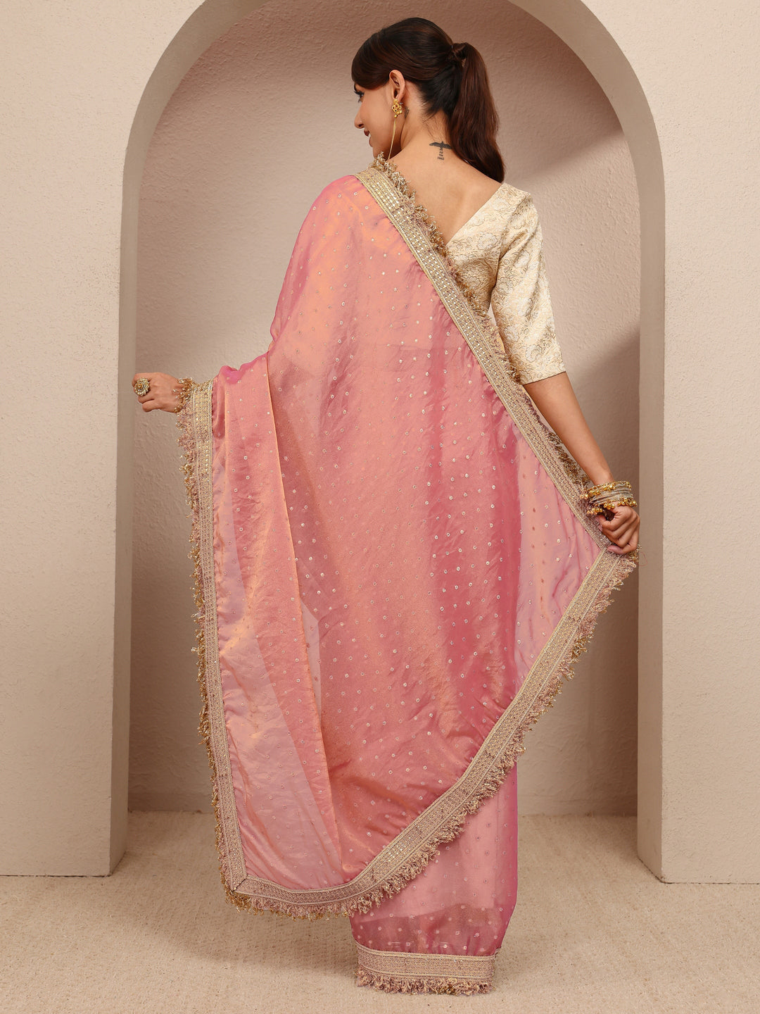  Pink Woven Design Tissue Saree
With Unstitched Blouse Piece 