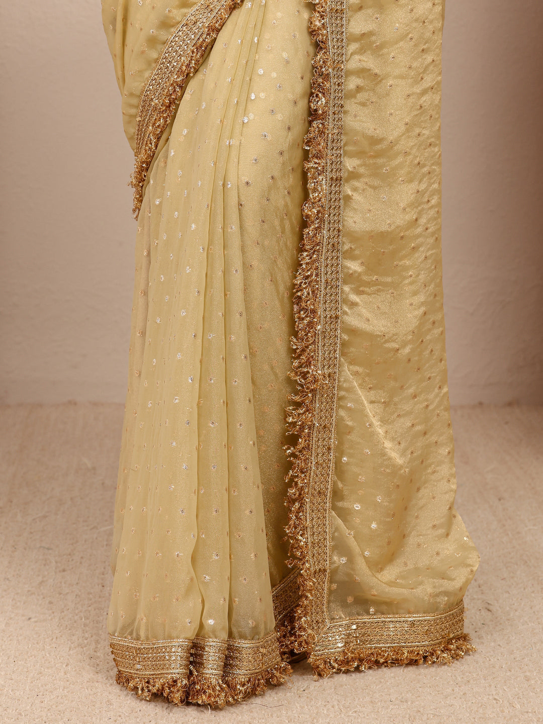  Gold Woven Design Tissue Saree
With Unstitched Blouse Piece 