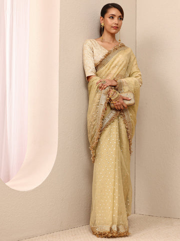 Gold Woven Design Tissue Saree
With Unstitched Blouse Piece