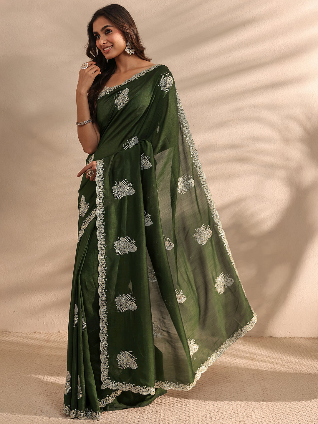  Green Embellished Silk Blend Saree 
With Unstitched Blouse Piece 