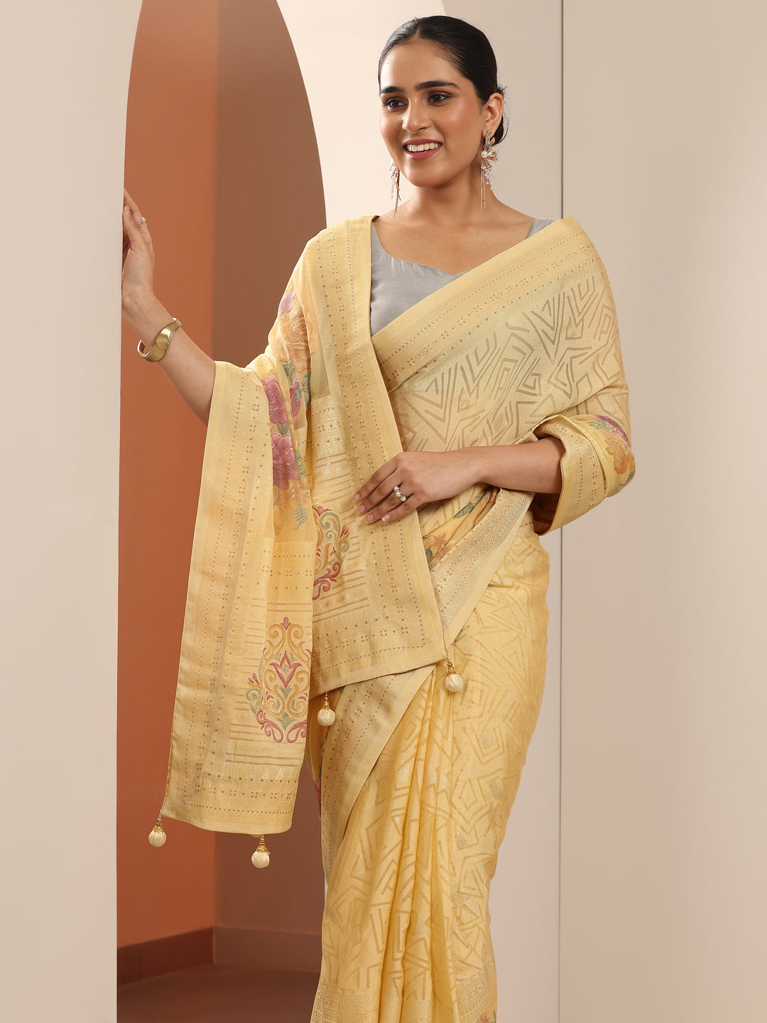  Yellow Printed Georgette Saree With Unstitched Blouse Piece 