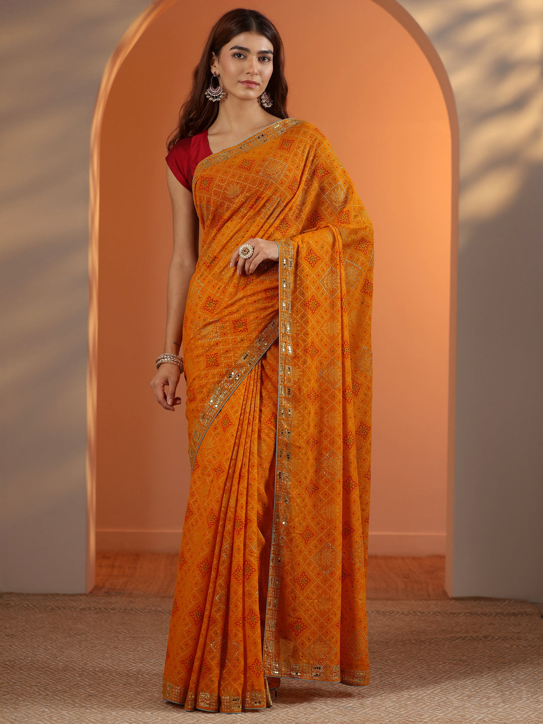 Mustard Printed Georgette Saree With Unstitched Blouse Piece
