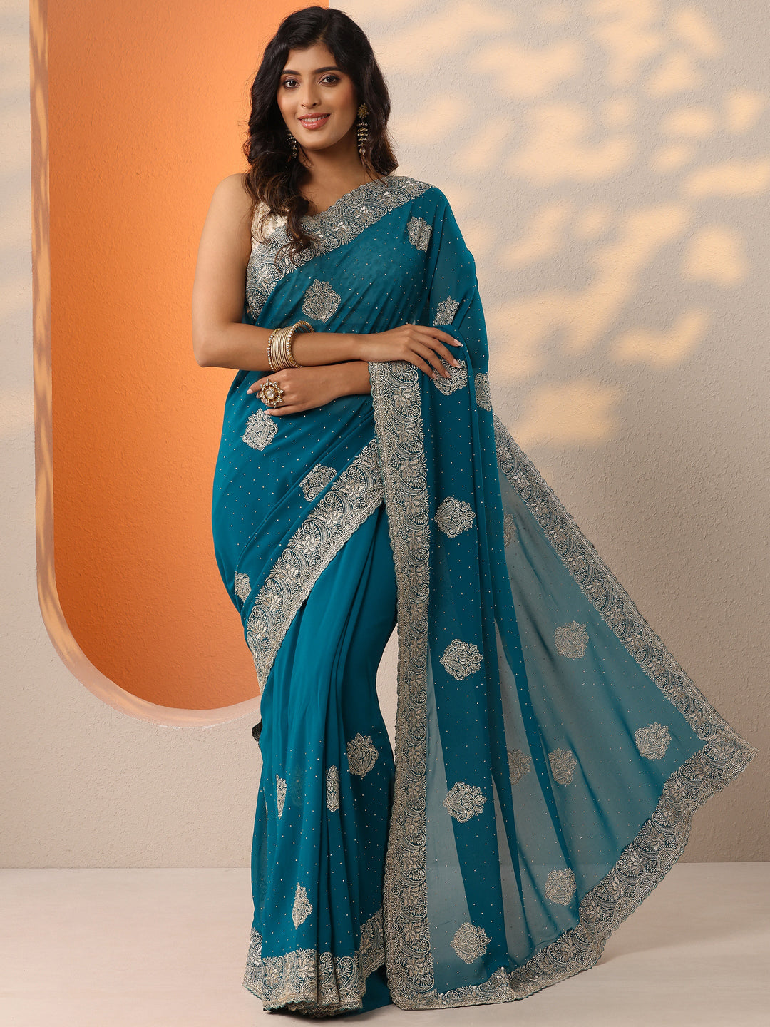  Blue Embroidered Georgette Saree With Unstitched Blouse Piece 
