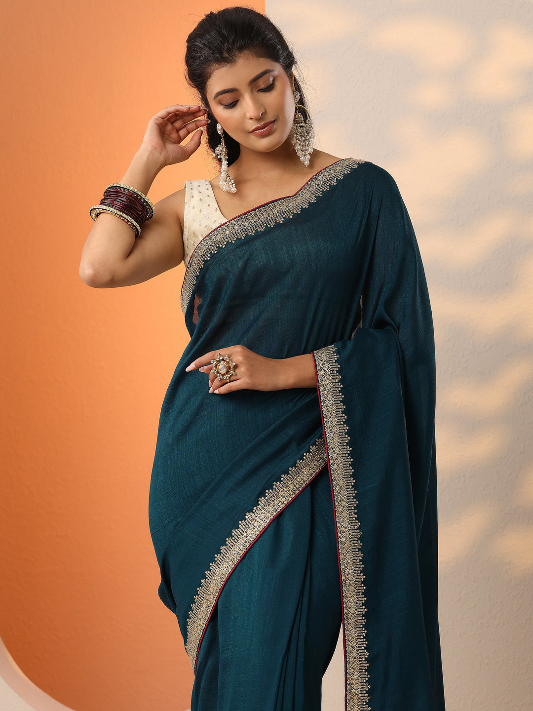  Teal Solid Silk Blend Saree With Unstitched Blouse Piece 