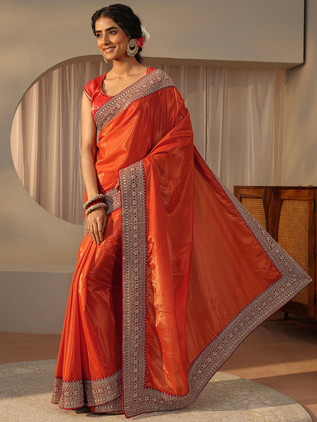  Orange Embellished Border Glossy Satin Saree 