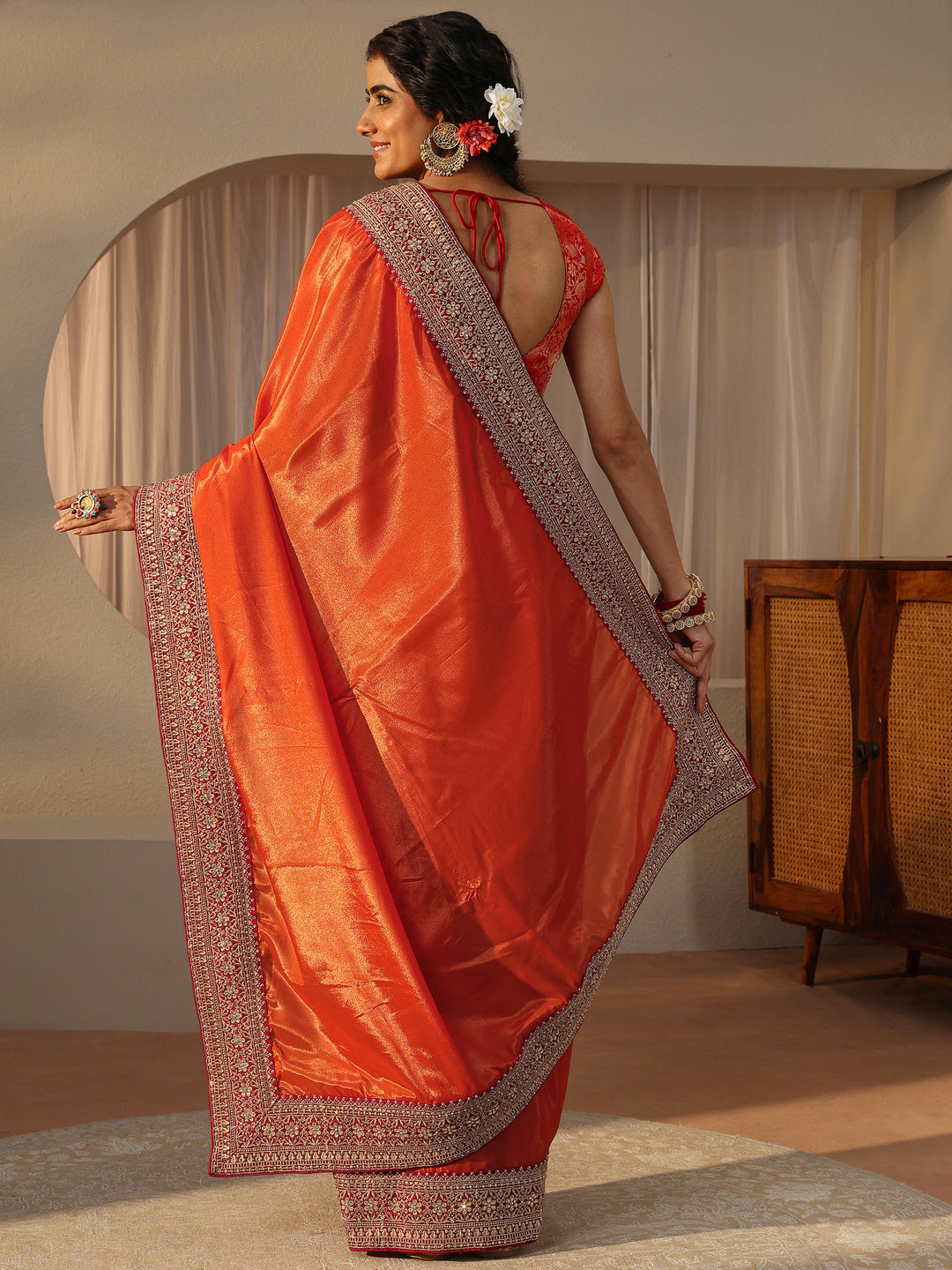  Orange Embellished Border Glossy Satin Saree 