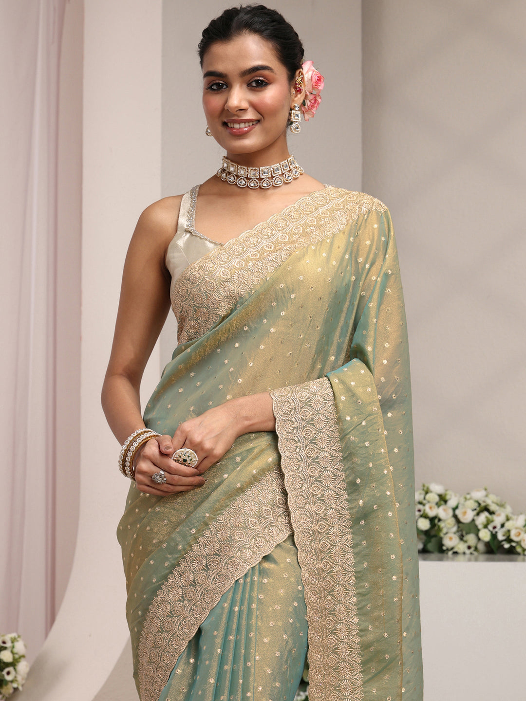  Green Woven Design Tissue Saree With Unstitched Blouse Piece 