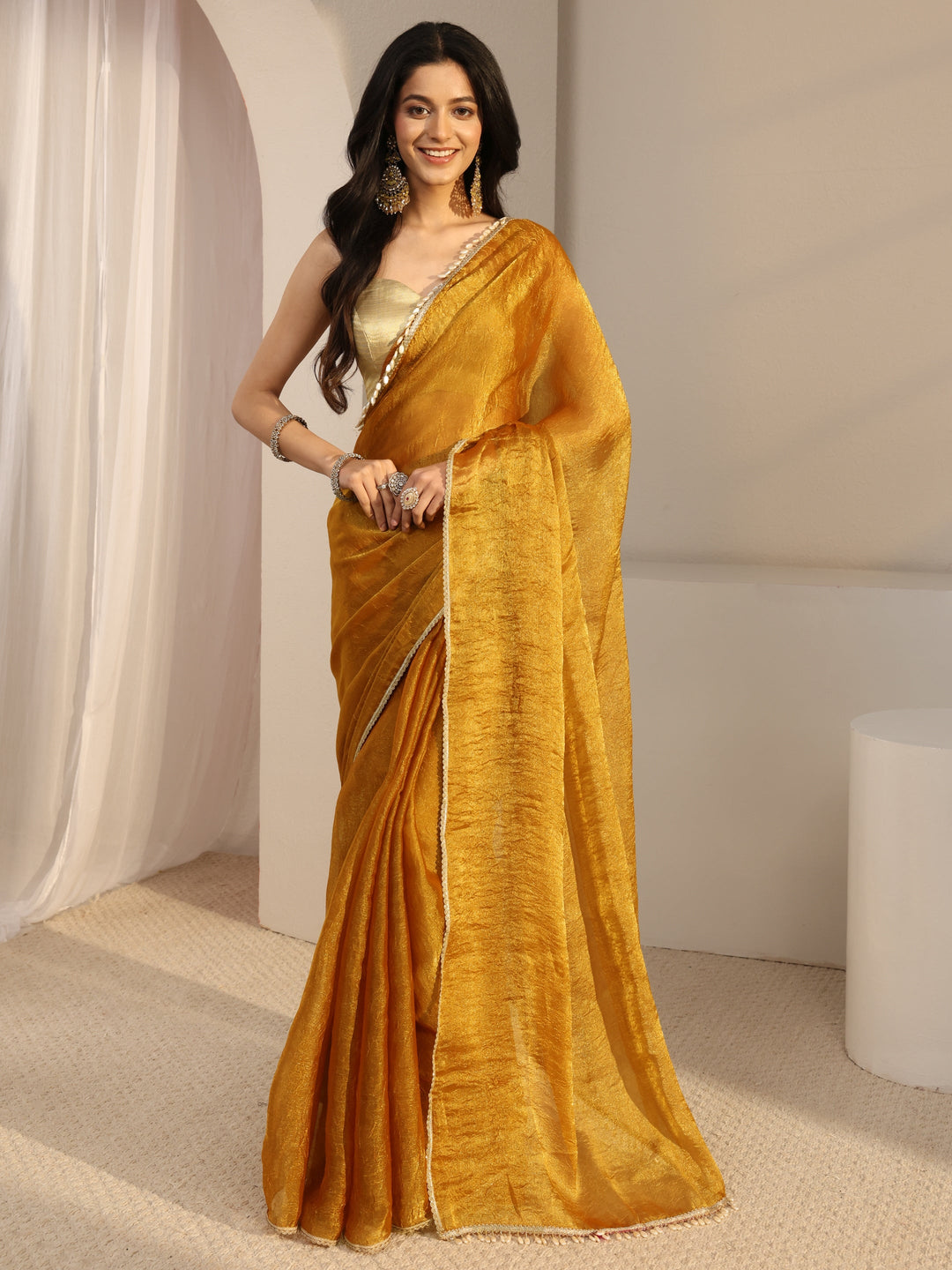  Mustard Solid Tissue Saree With Unstiched Blouse Piece 