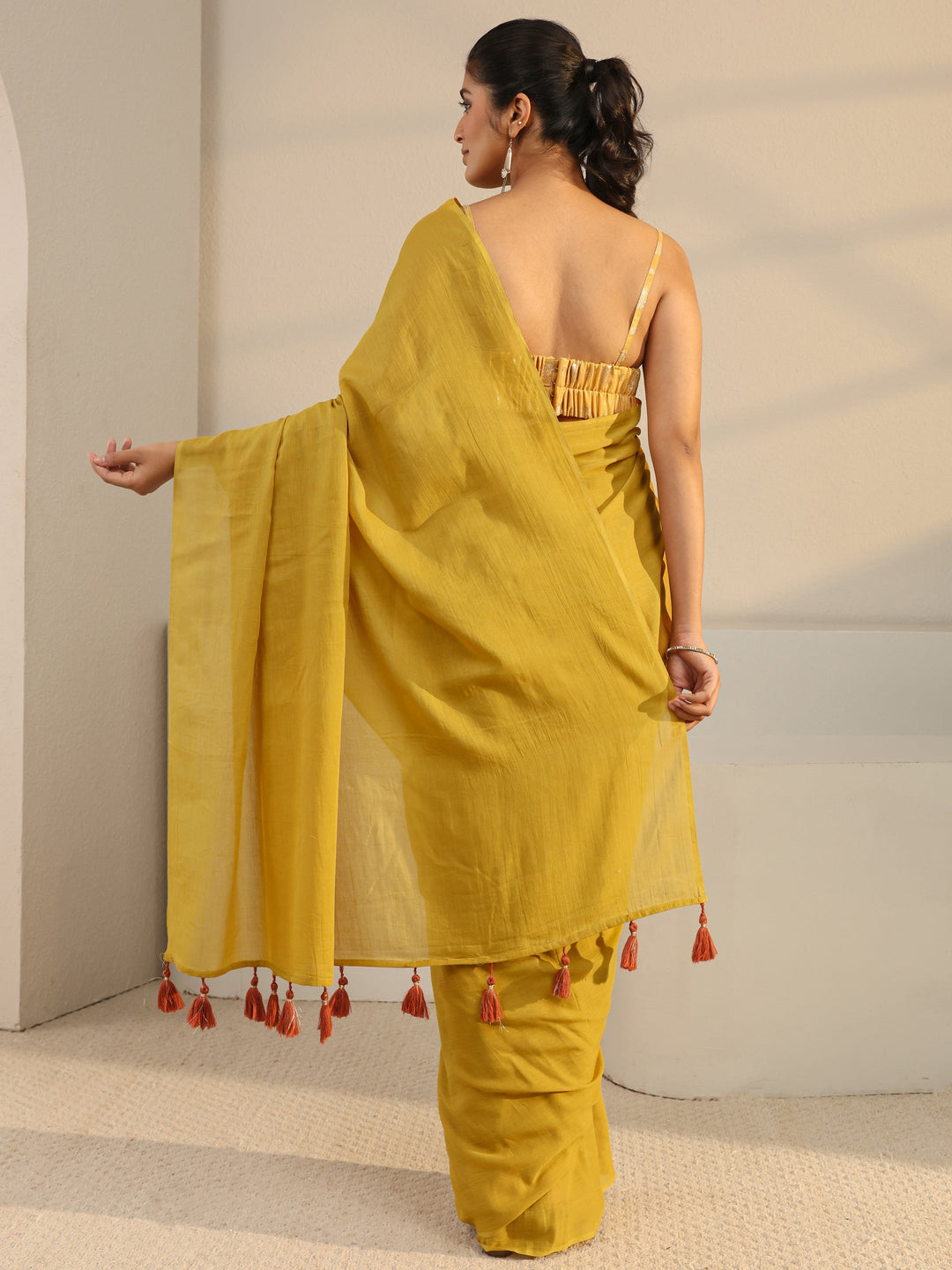  Mustard Solid Cotton Tassel Saree With Unstitched Blouse Piece 