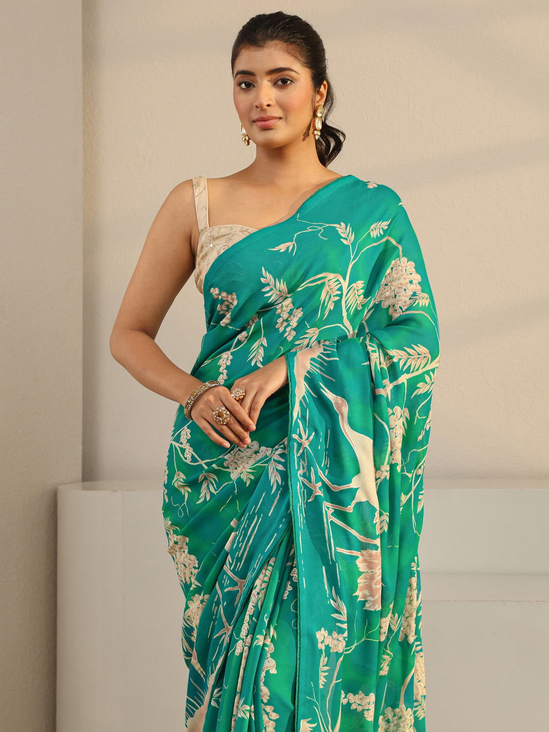  Libas Green Floral Printed Georgette Tassel Saree With Unstitched Blouse Piece 
