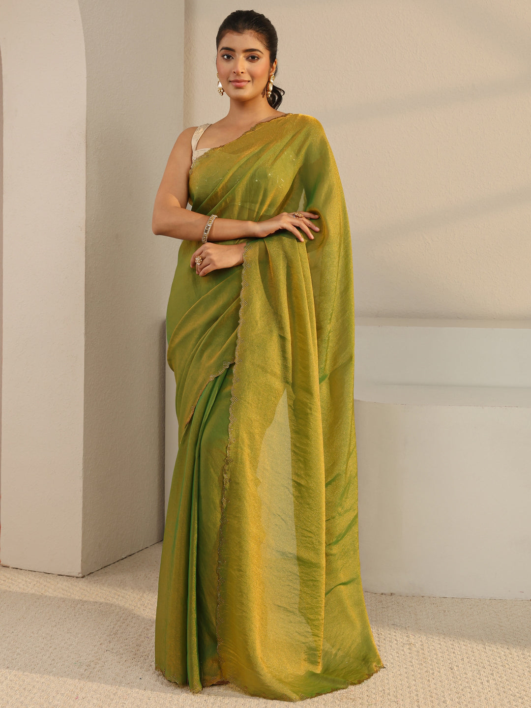  Green Solid Tissue Saree With Unstitched Blouse Piece 