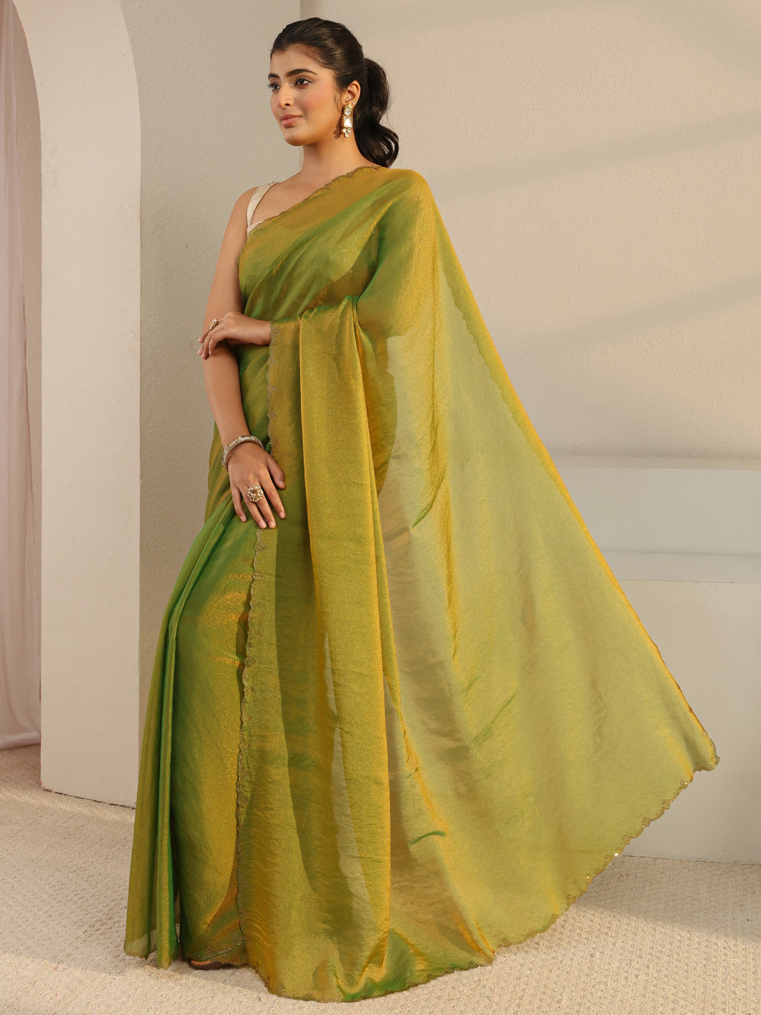  Green Solid Tissue Saree With Unstitched Blouse Piece 
