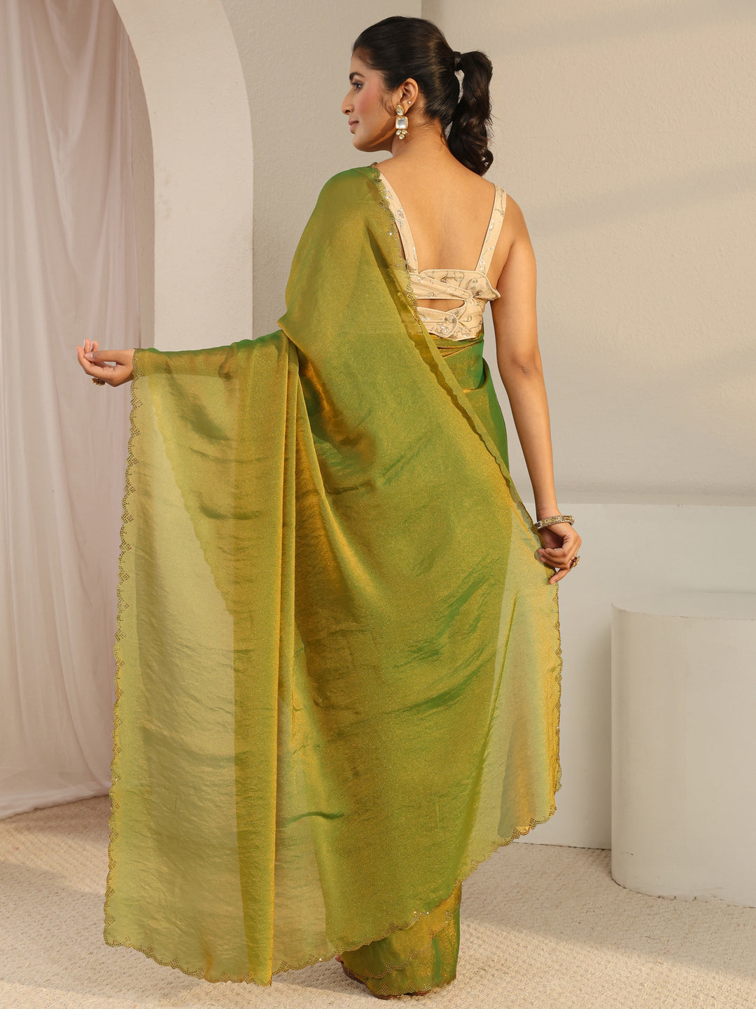  Green Solid Tissue Saree With Unstitched Blouse Piece 
