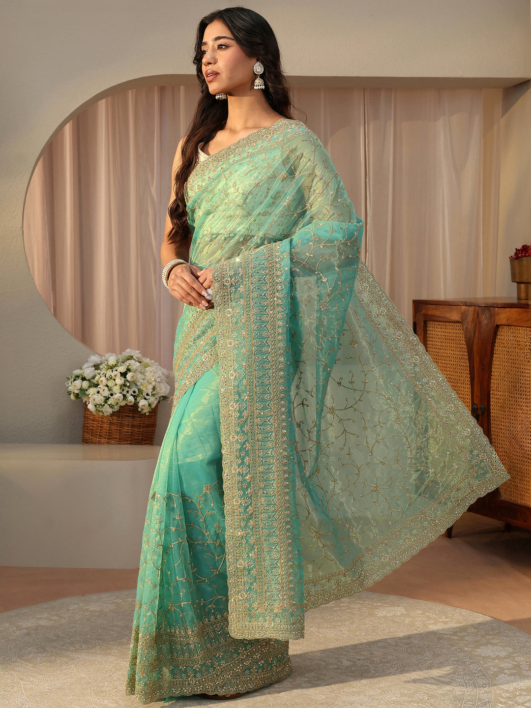  Green Floral Embroidered Glossy Net Saree 