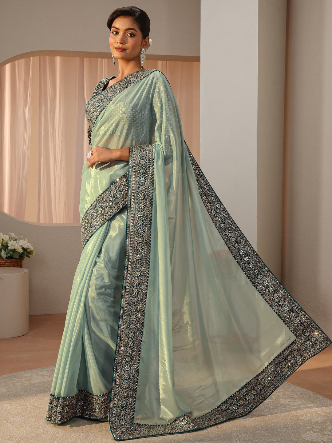  Sea Green Satin Saree With Floral Border 