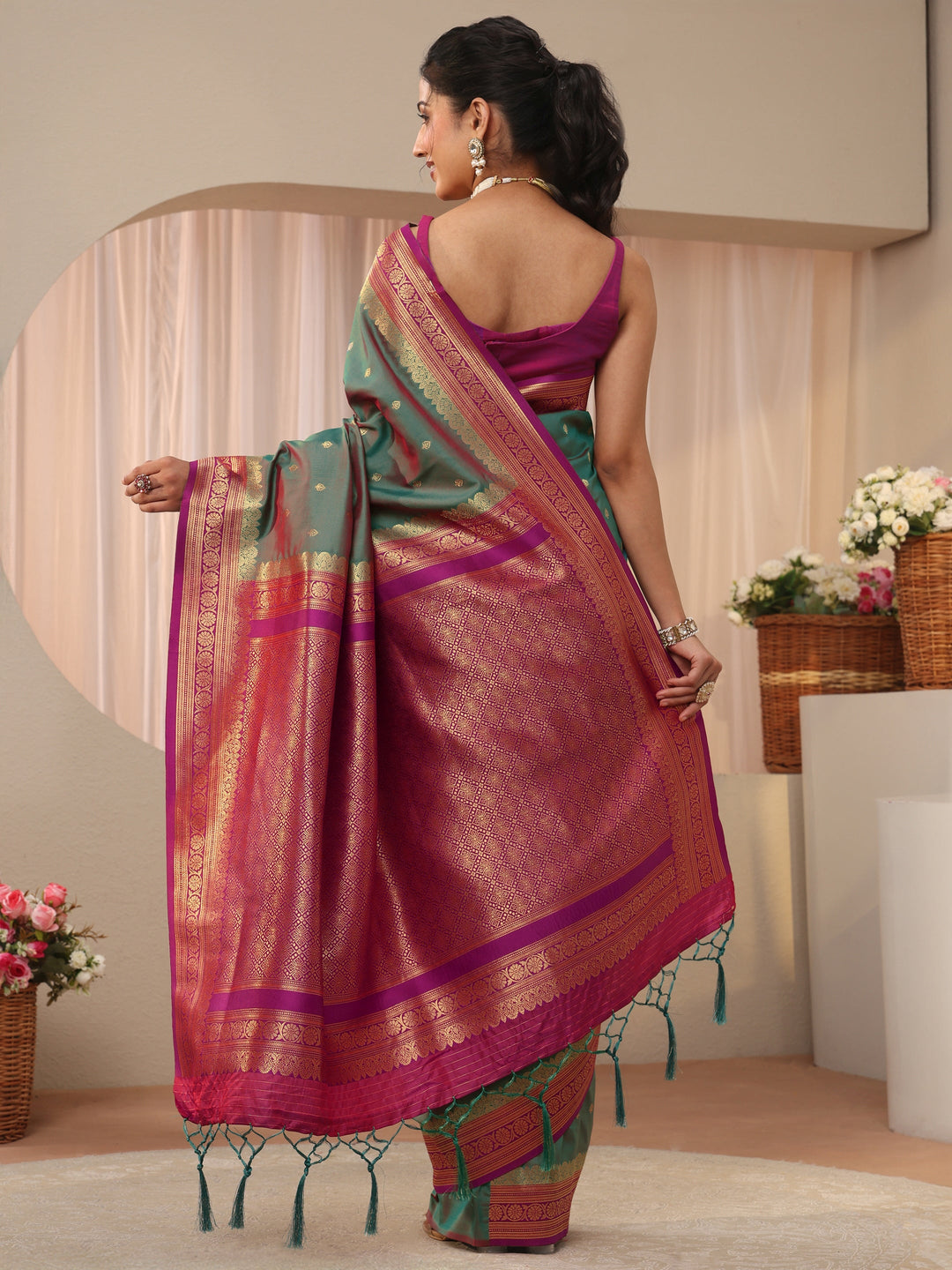  Green Ethnic Motif Self Design Silk Blend Saree 
