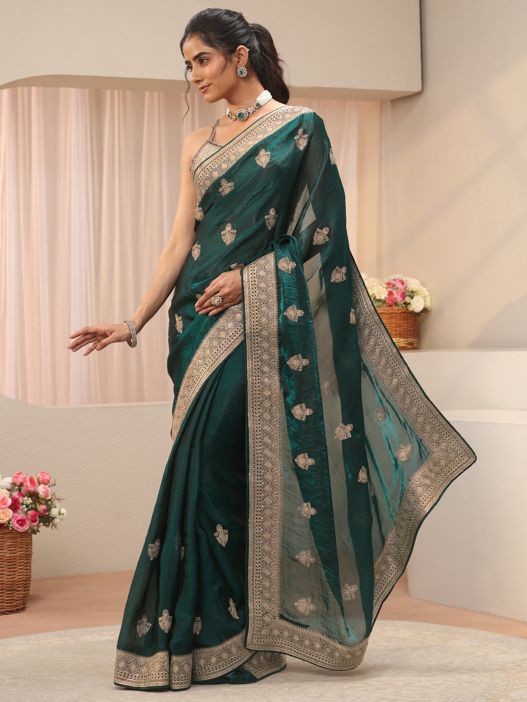  Green Ethnic Motif Embroidered Tissue Saree 