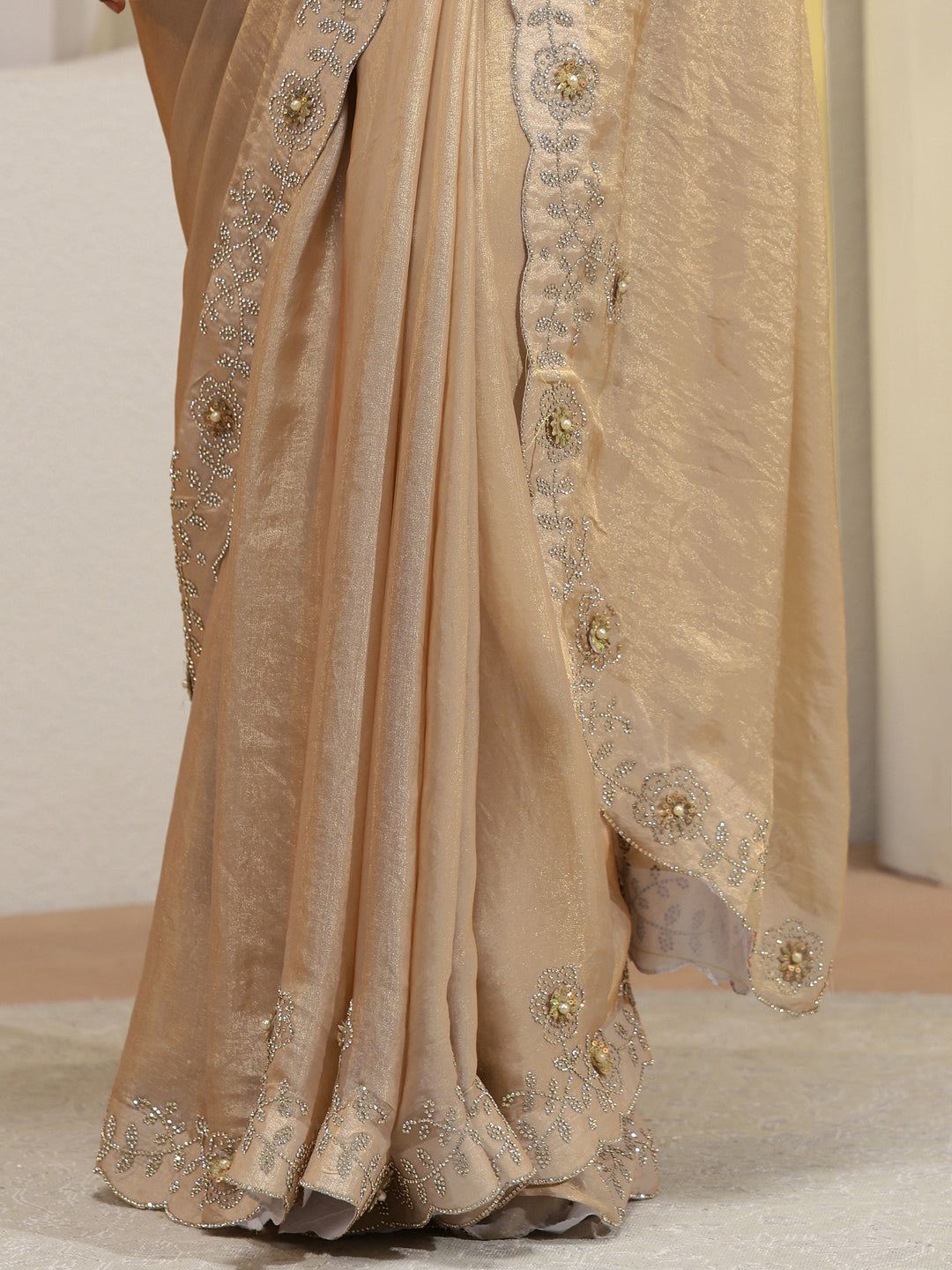  Golden Tissue Saree With Embellished Border 