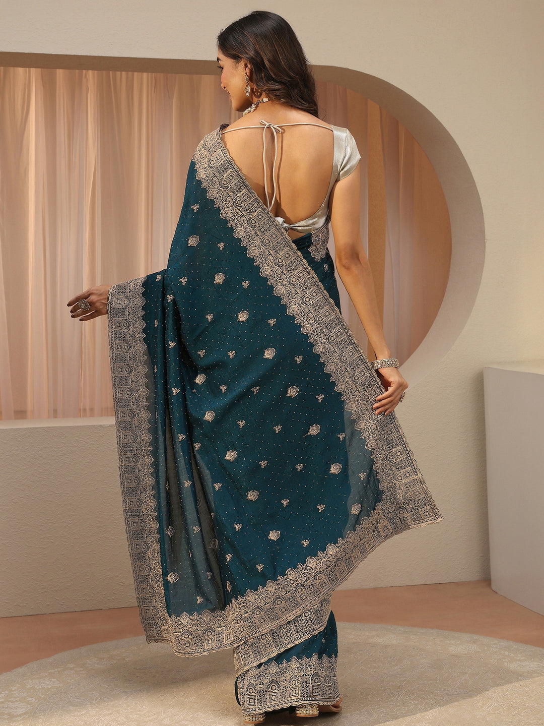  Teal Tissue Saree With Embellished Border 
