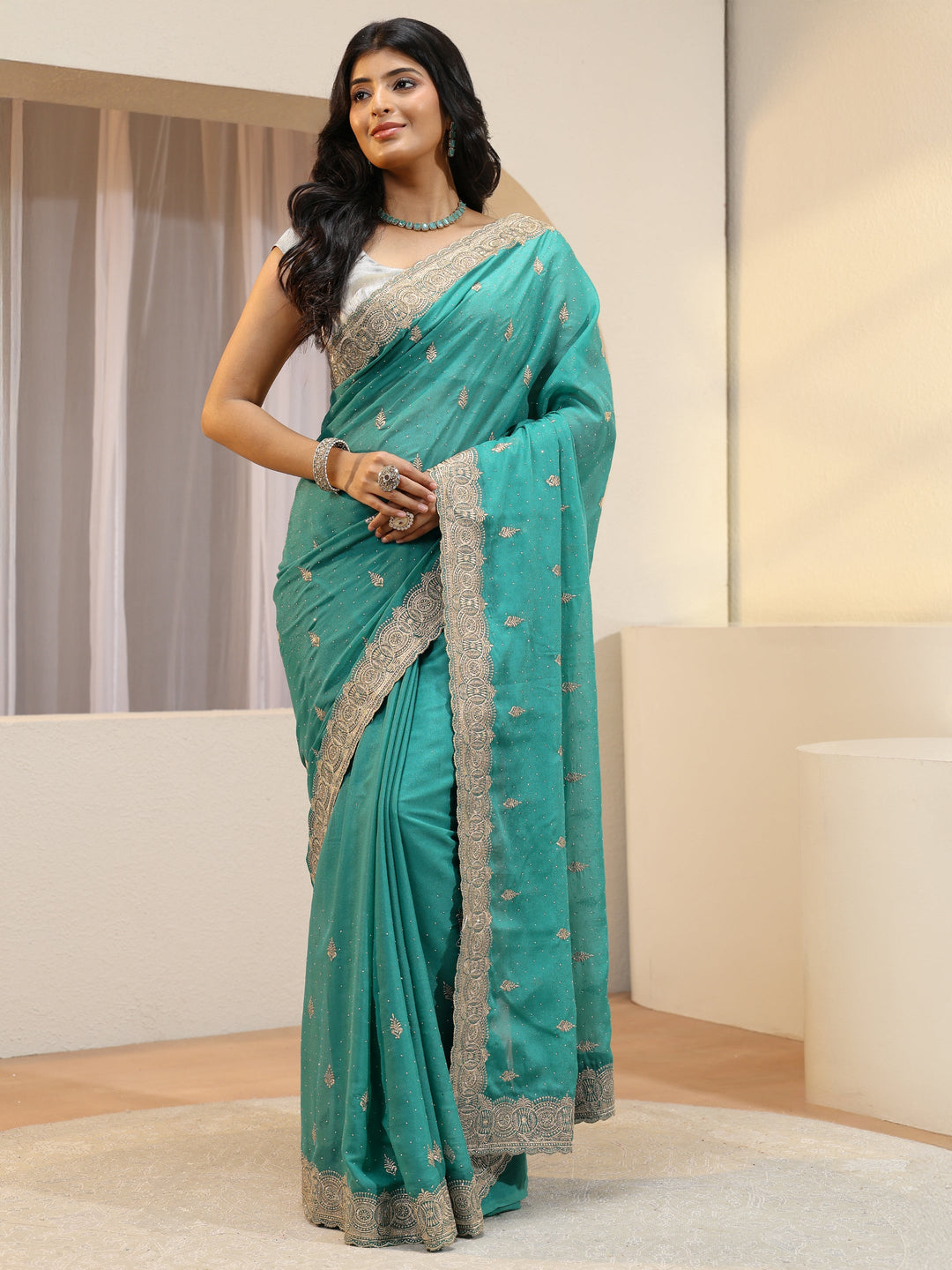  Sea Green Tissue Saree With Embellished Border 